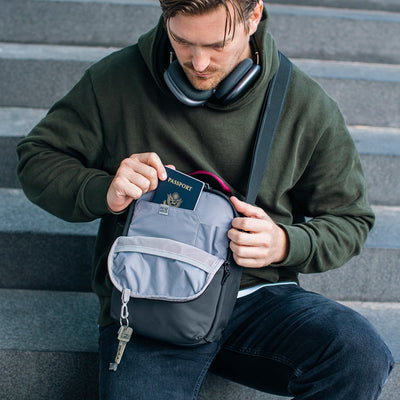 Pacsafe® X anti-theft vertical crossbody (lifestyle)